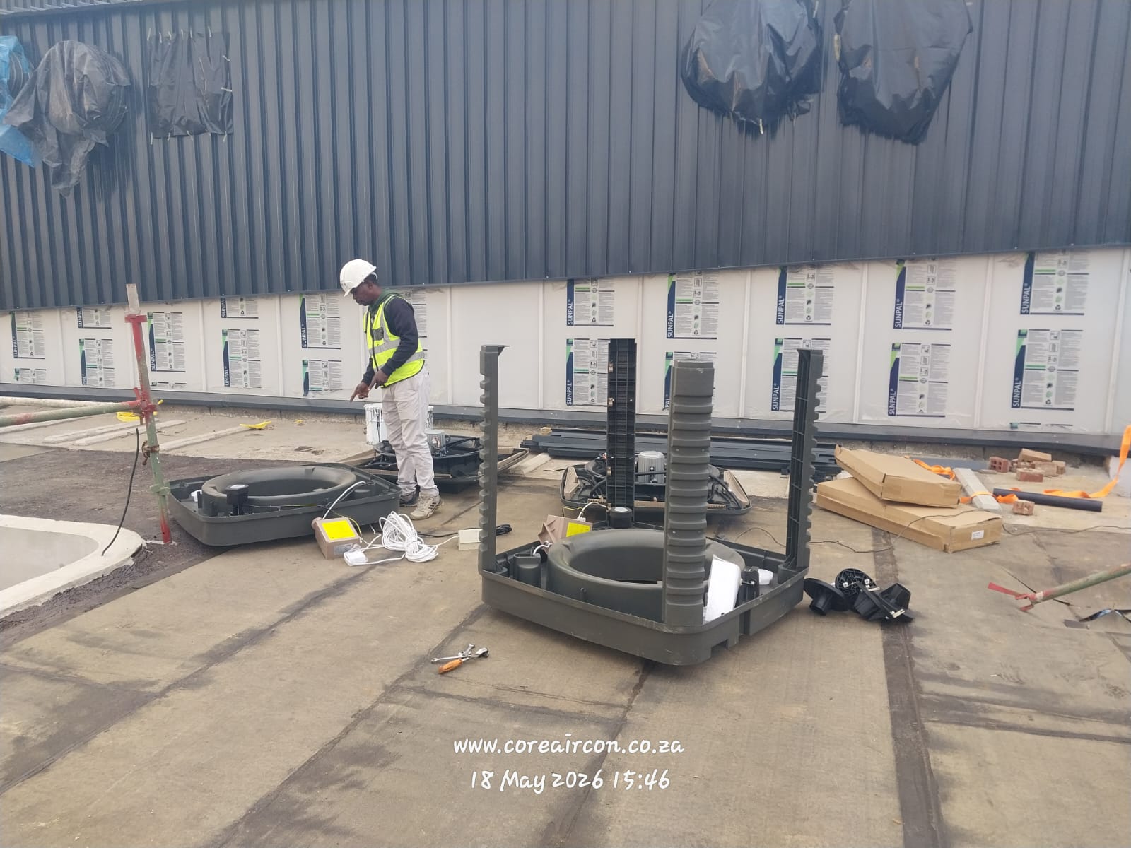 Assembling evaporative cooling unit housings on a rooftop