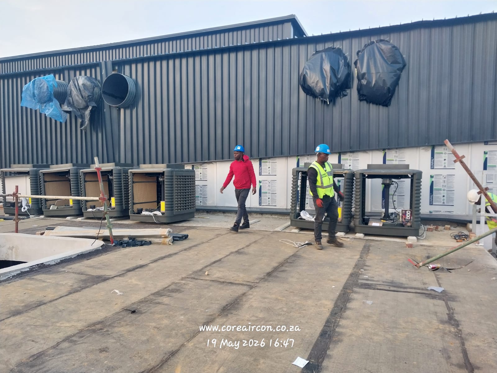 Evaporative cooling units installed on a commercial rooftop