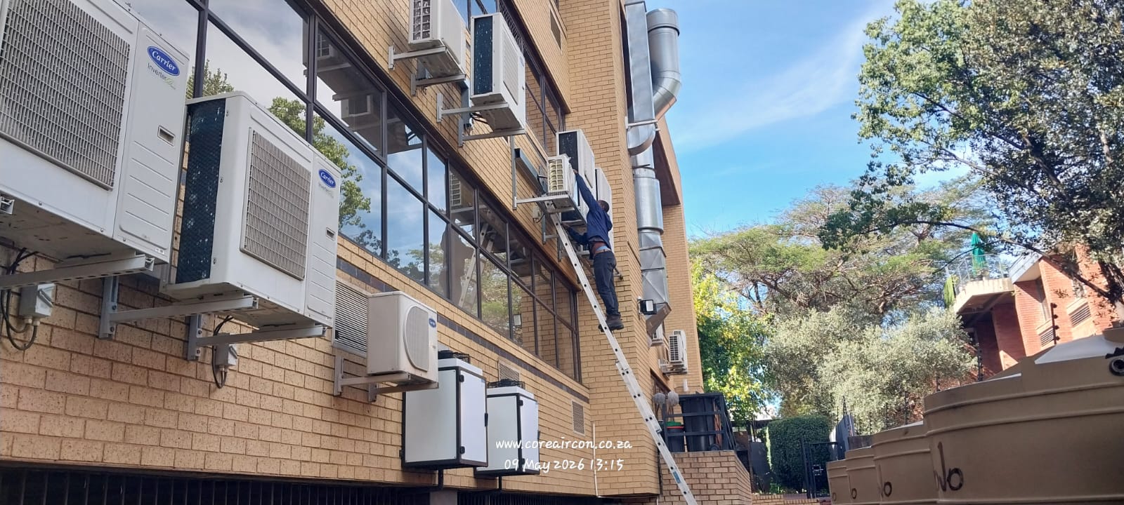 Multiple split unit condensers installed on an office building