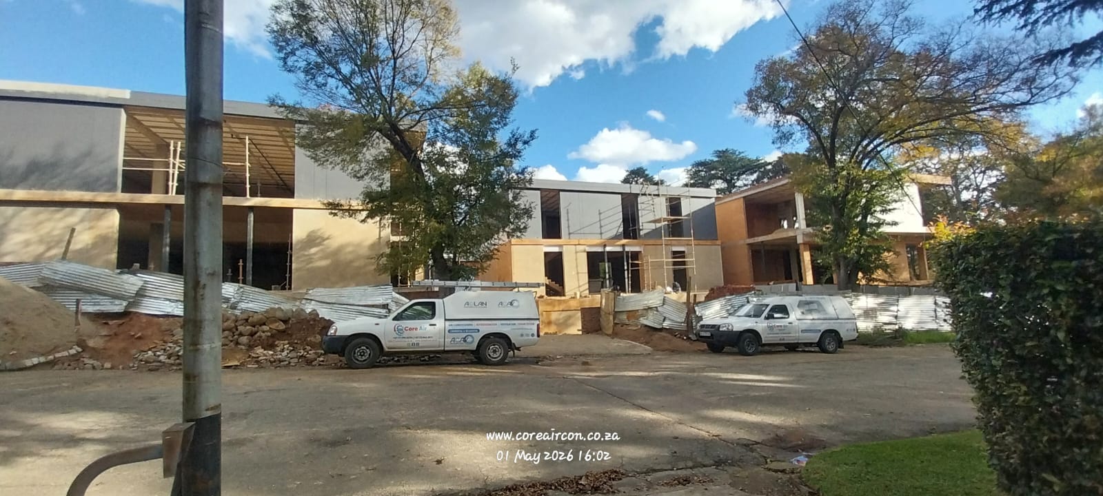Core Air vehicles on site at a residential construction project