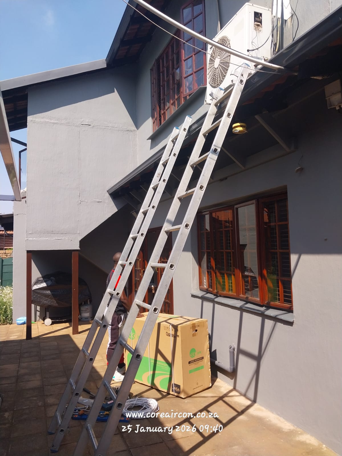 Split unit outdoor installation on a residential roof