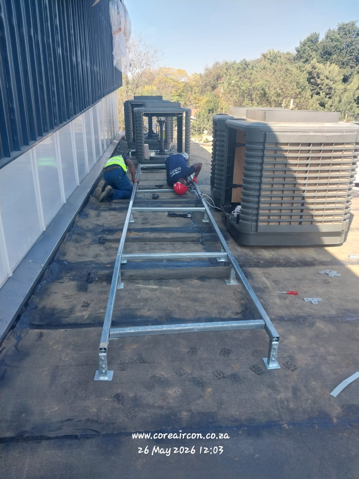 Mounting frame installation for rooftop cooling units